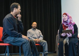 Photos by Julia Johnson, staff photographer Bratt Jones and Stephanie Wagner perform a mock interview while Chris Harris watches.