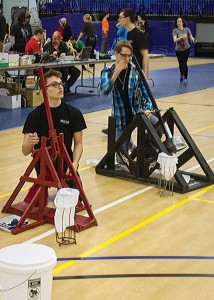 Photo by Julia JohnsonTeam Klopimia members from Highland High School (L to R): Josh Wagner, and Gavin Hemphill working their trebuchets.