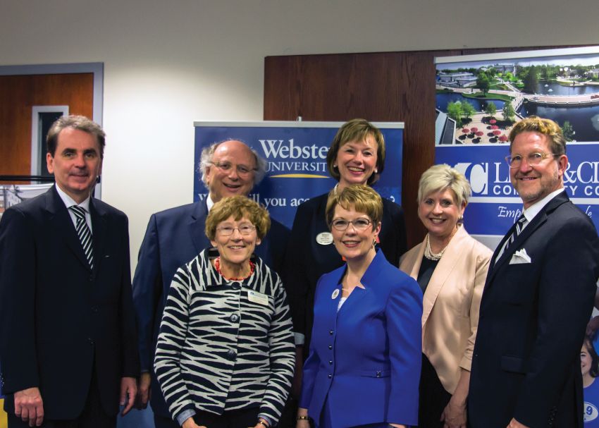 Photo by Julia Johnson Webster University President Elizabeth Stroble signs new nursing agreement with L&C President Dale Chapman.