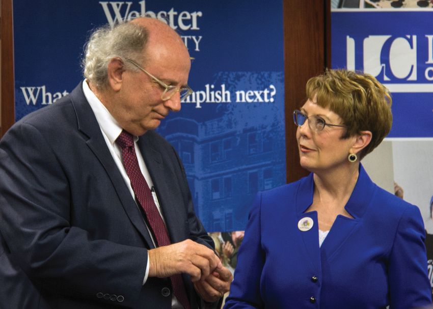 Photo by Julia Johnson Webster University President Elizabeth Stroble signs new nursing agreement with L&C President Dale Chapman.