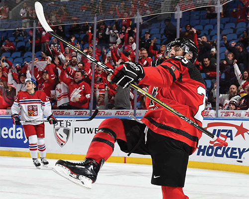 Jordan Kyrou celebrates goal against Czech Republic at 2018 World Junior Championship.