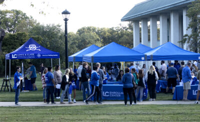 potential students around information booths